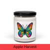 Front view: Juliet’s Butterfly soy candle — 9oz glass jar with butterfly label, Apple Harvest scent.