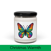 Front view: Juliet’s Butterfly soy candle — 9oz glass jar with butterfly label, Christmas Warmth scent.