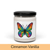 Front view: Juliet’s Butterfly soy candle — 9oz glass jar with butterfly label, Cinnamon Vanilla scent.