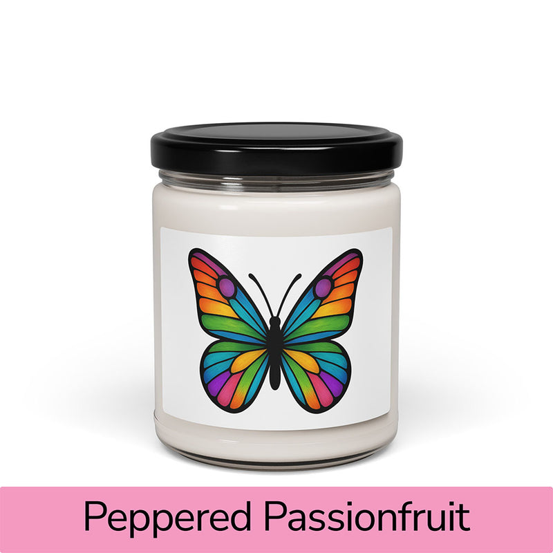 Front view: Juliet’s Butterfly soy candle — 9oz glass jar with butterfly label, Peppered Passionfruit scent.