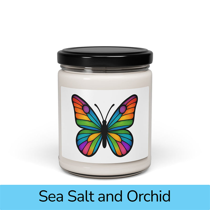 Front view: Juliet’s Butterfly soy candle — 9oz glass jar with butterfly label, Sea Salt and Orchid scent.