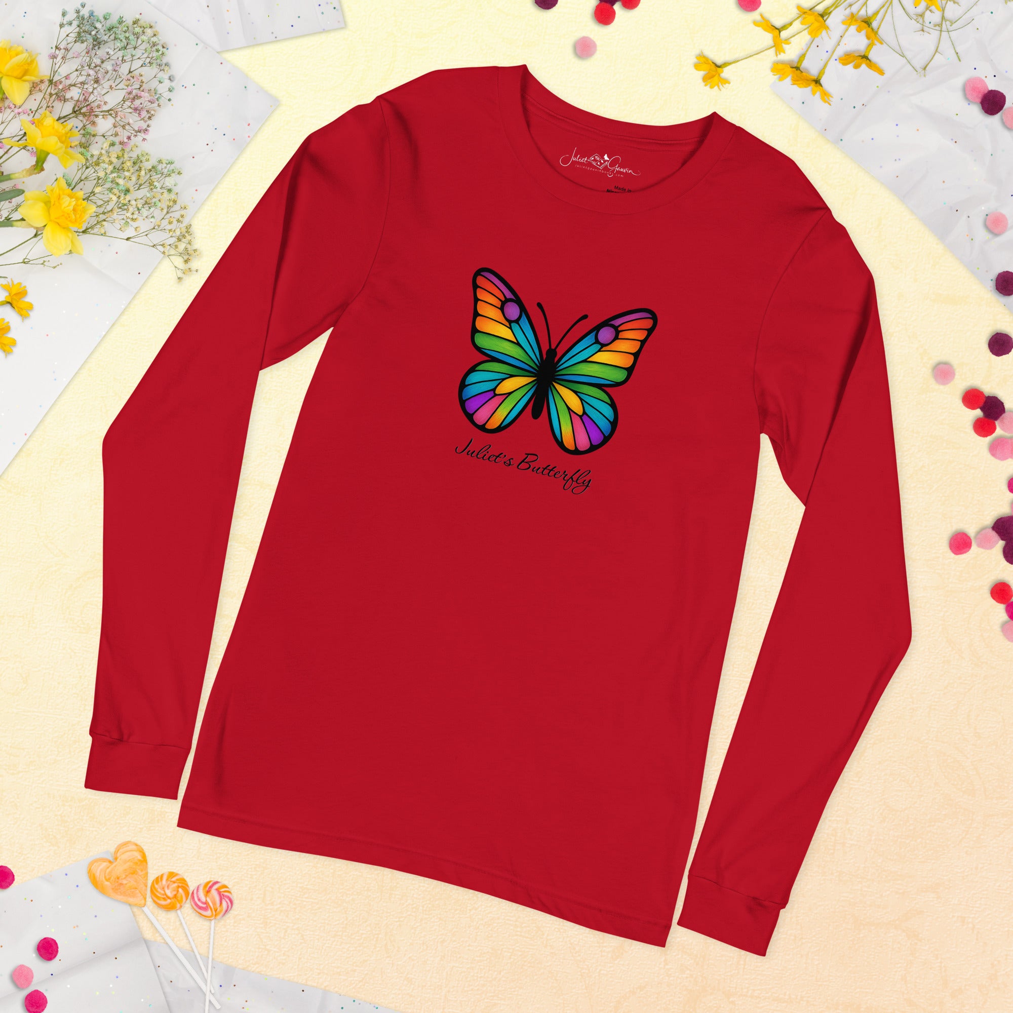 Flat view of butterfly print on Mags Red long sleeve — spectrum wing detail.