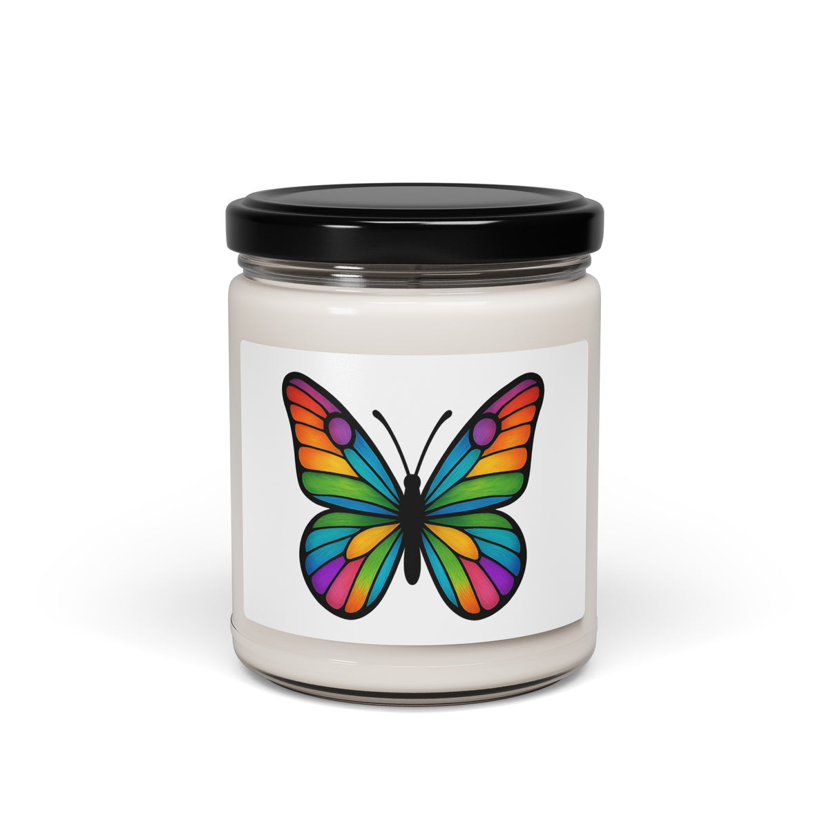 Front view: Juliet’s Butterfly soy candle — 9oz glass jar with butterfly label.